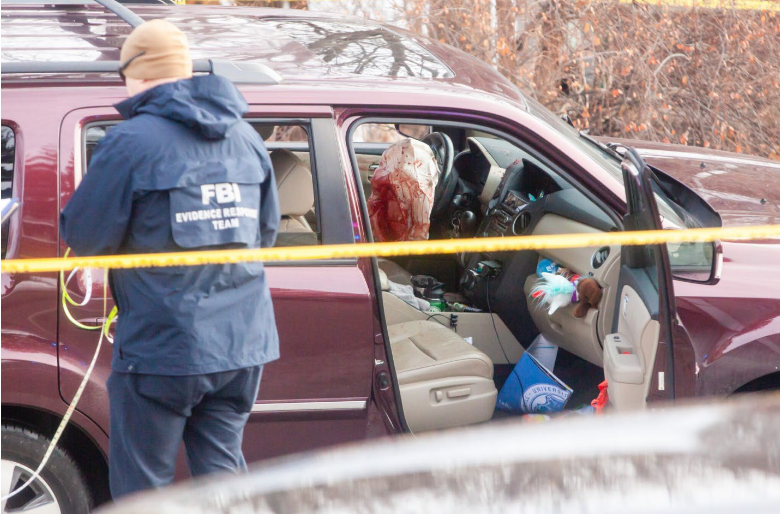 [The crashed SUV after the killing, blood covered airbags. (Photo by Nicole Neri/Minnesota Reformer)]